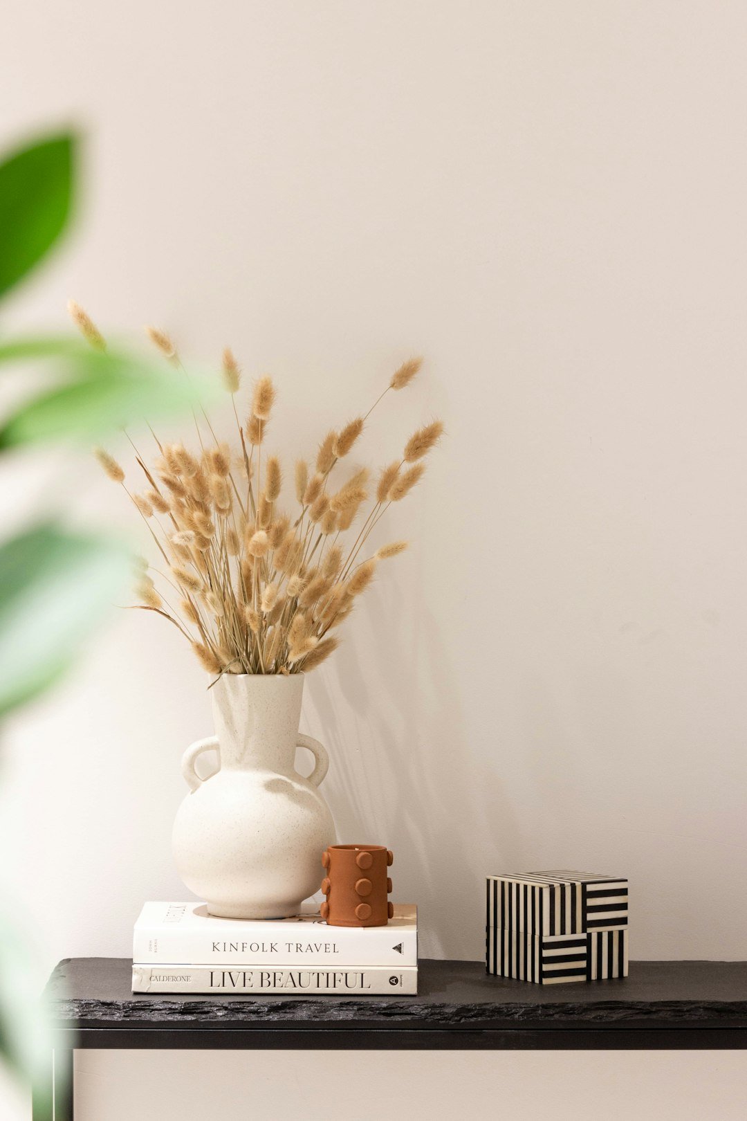 Clean minimal styled coffee table vignette