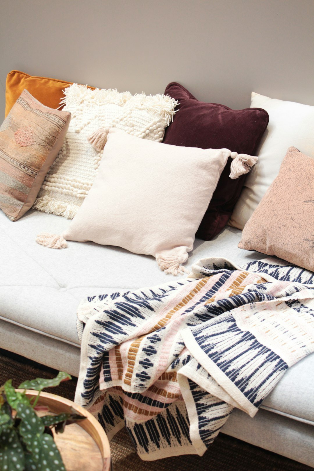 Knit throw pillows adding texture to a cozy sofa