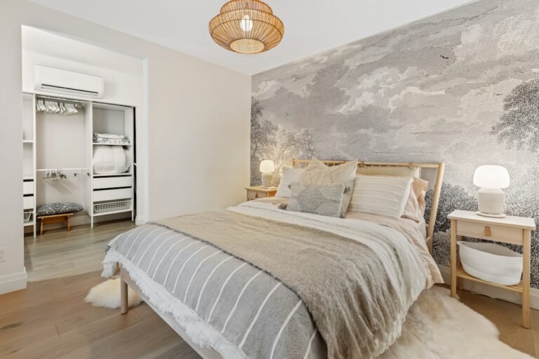 Patterned accent wallpaper wall in a bedroom