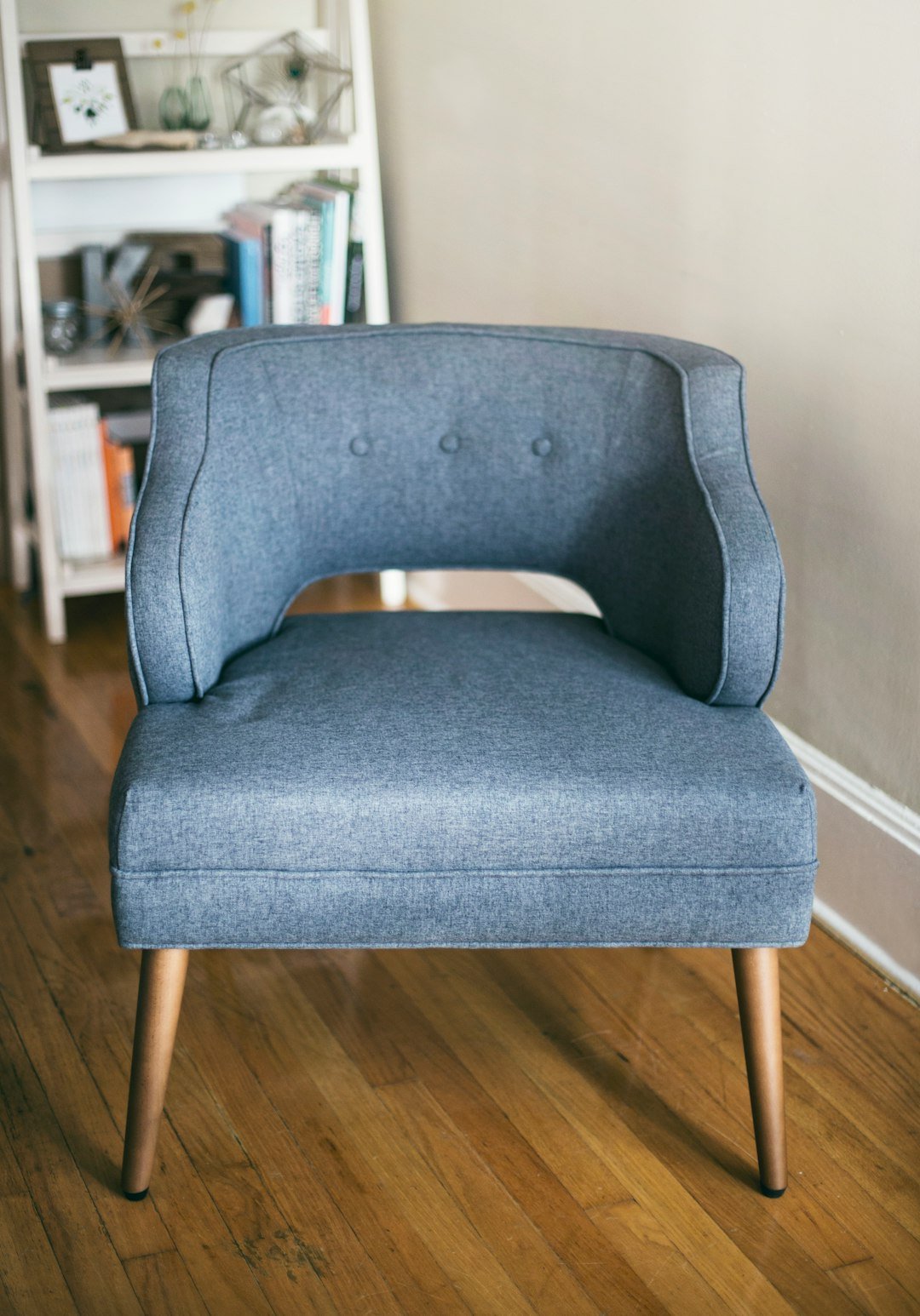 Small loveseat armchair suited to a narrow room