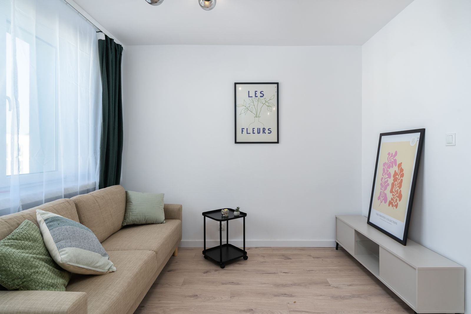 Minimalist living room with a cozy sofa and simple decor — every seat earns its floor space