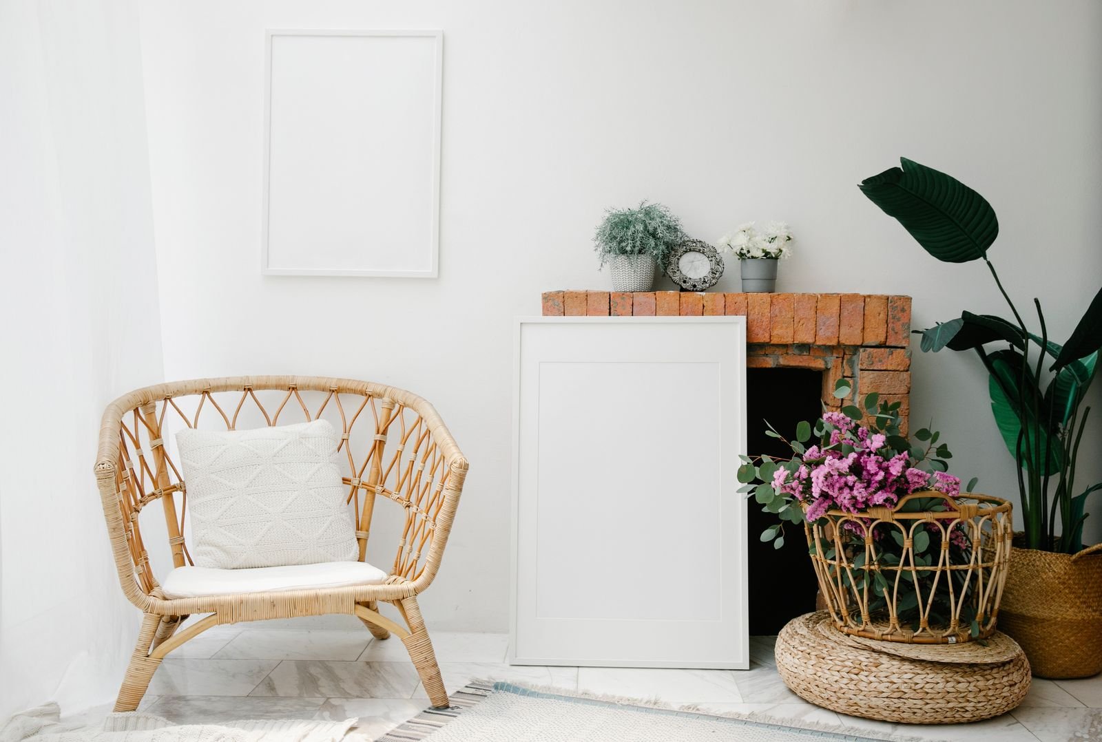 Tidy minimalist corner with a wicker chair, pillow, and flowers