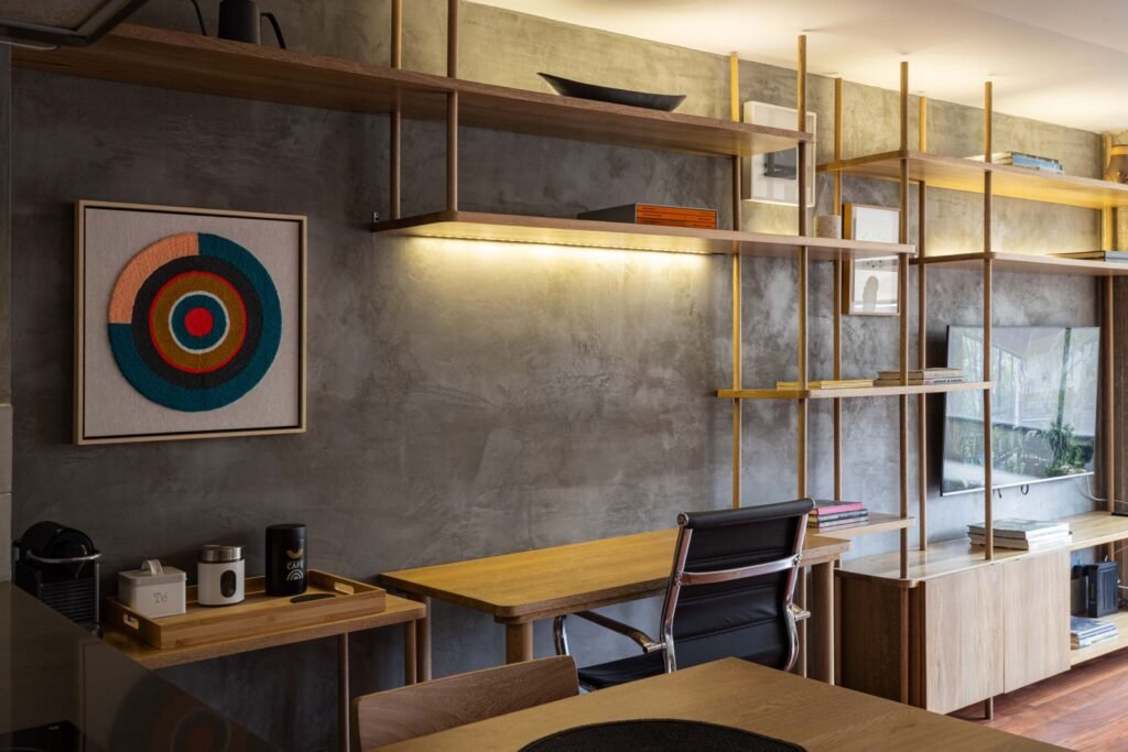 Contemporary wooden wall shelves arranged around a desk with a lamp above — vertical storage ideas