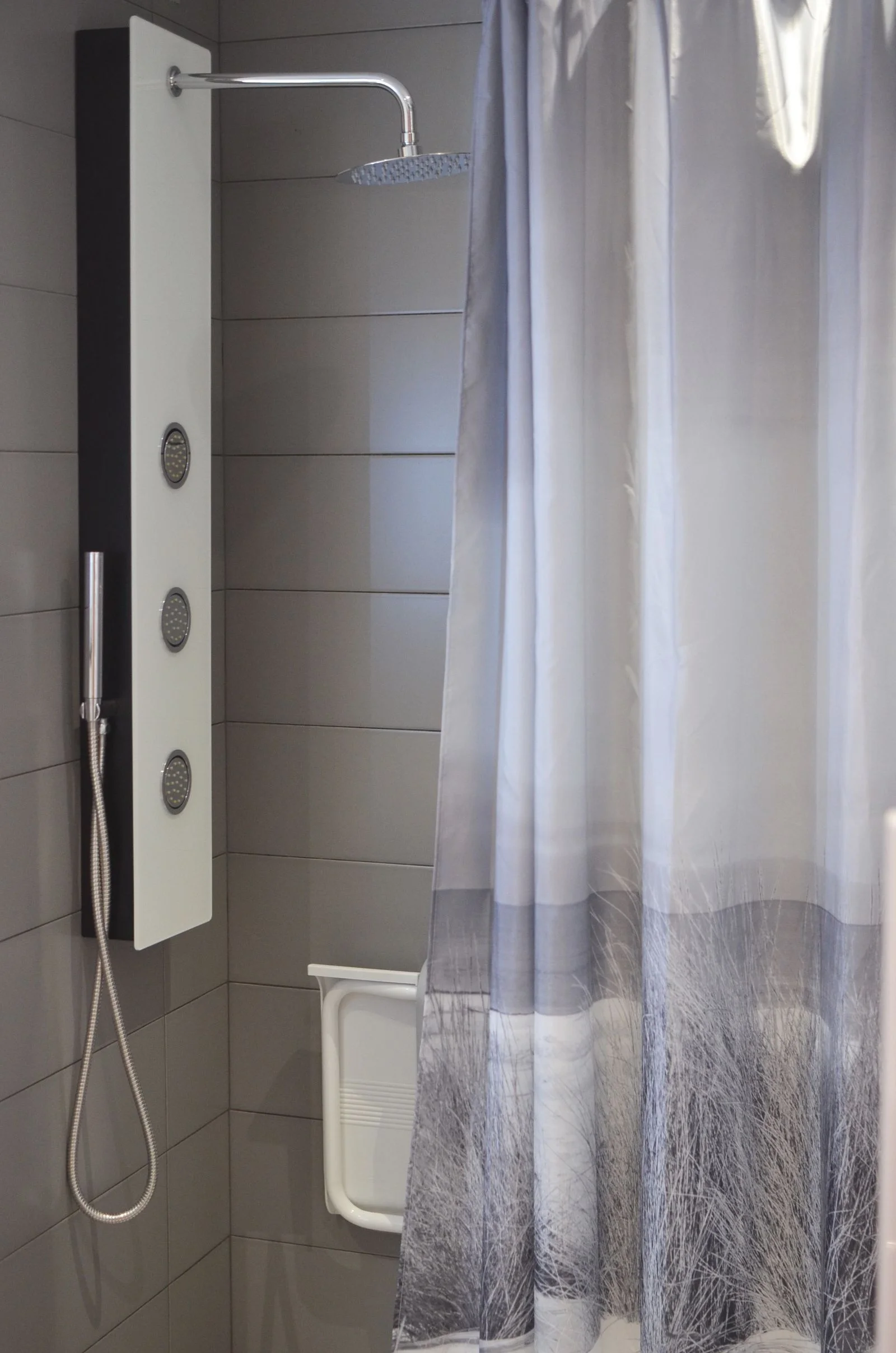 Wooden wall-mounted table with a pull-out drawer and a white chair, mirror above, patterned curtains — 1. a fold-down desk that closes at night