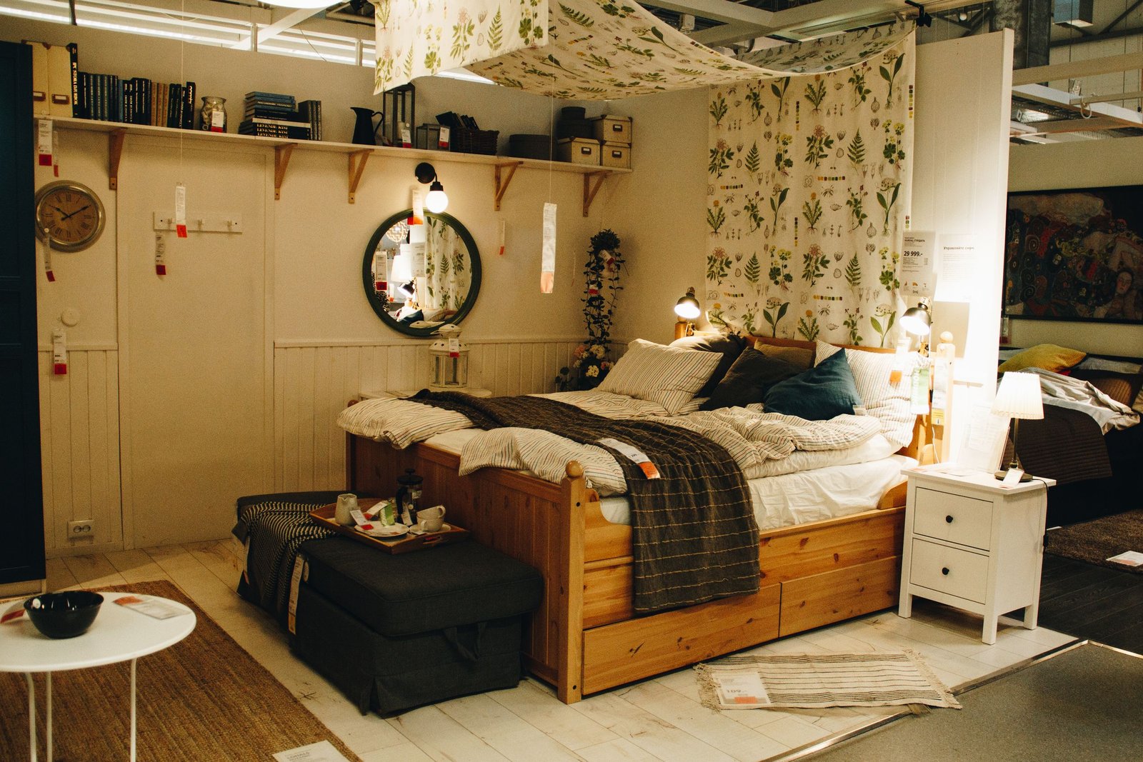 Small cozy bedroom with storage boxes tucked neatly under the bed.